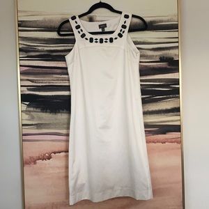 White dress with black stones on neck line